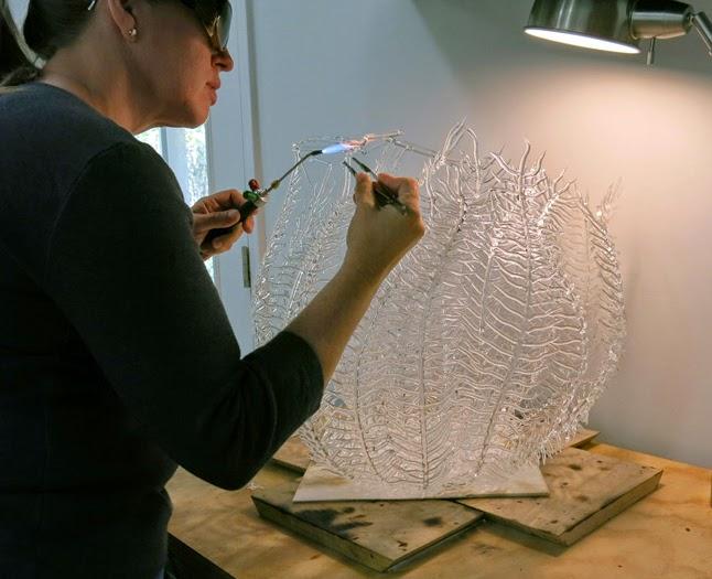 Emily Williams and her Glass Seaweed sculpture